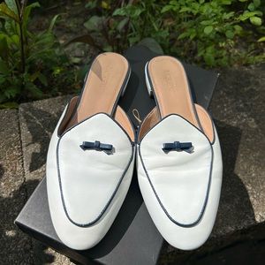 Darling leather bow mules in classic white and navy